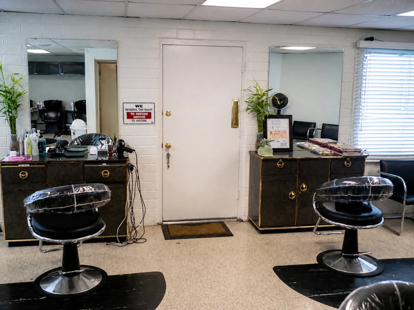 Styling stations inside Chino's One Stop Hair Salon